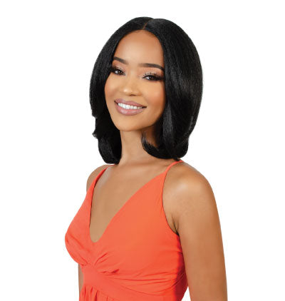 Woman with short black synthetic lace wig wearing an orange dress on a white background