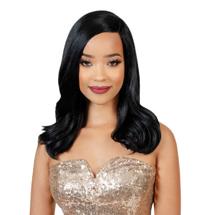 Woman with long black hair wearing a sparkly dress on a white background