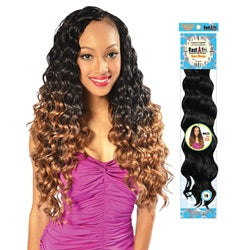 Woman with styled wavy hair and a package of hair extensions on a white background