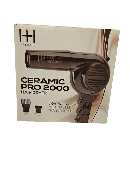 Ceramic hair dryer inside a white box 2 attachments inside