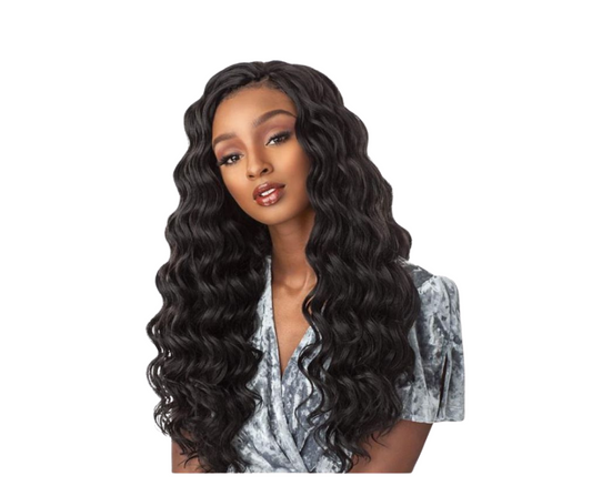 Woman with long, wavy black hair on a white background