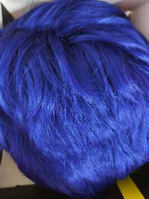Close-up of blue hair extensions with a blurred background