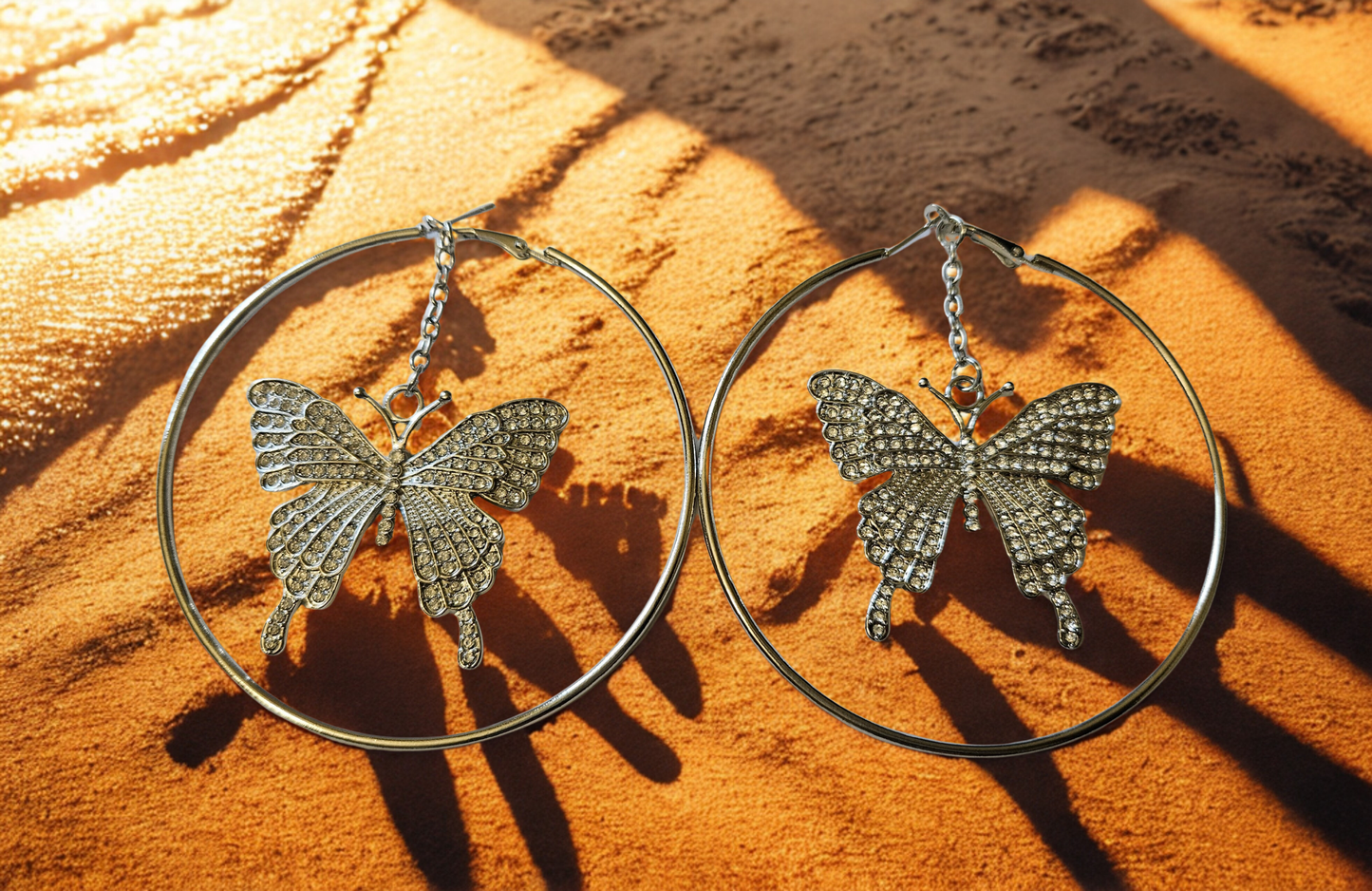 Butterfly jewelry. Hoop earrings. Silver tone earrings.