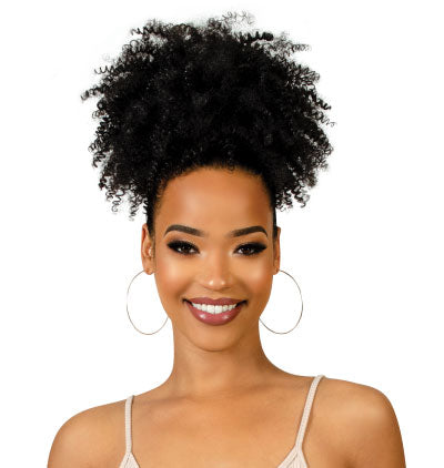 Woman with styled afro hair on a white background
