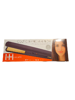 Gold ceramic flat iron with packaging on a table