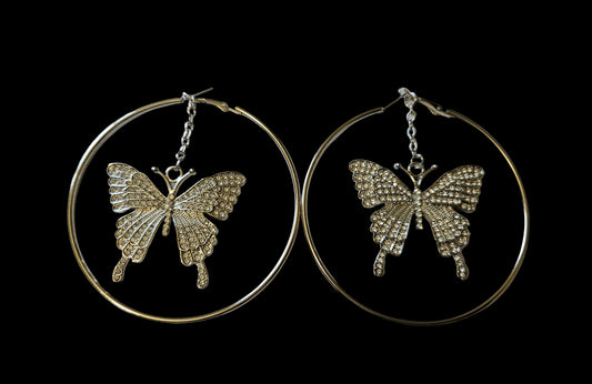 Hoop earrings in silvertone with rhinestone butterfly 