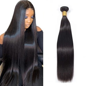 Woman with long straight hair and a bundle of black hair extensions.